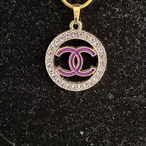 Elegant Gold and Purple Pendant